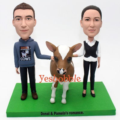 Couple Rubbing A Calf Custom Bobblehead Couple Rubbing A Calf Custom Bobblehead