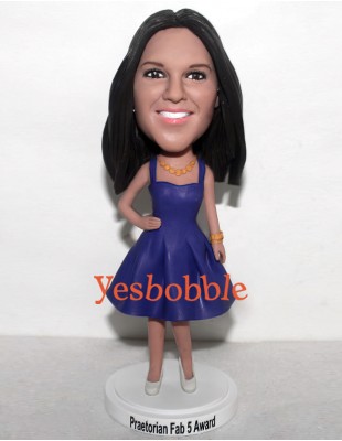 Girl in Bright Blue Dress with One Hand on Hips Bobblehead Girl in Bright Blue Dress with One Hand on Hips Bobblehead