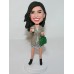 Lady Holding a Green Purse and Cup of Coffee Bobblehead
